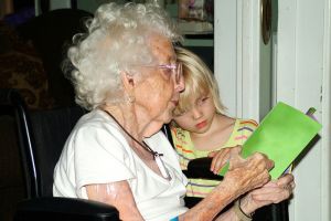 reading-with-grandmother-in-wheelchair-801960-m